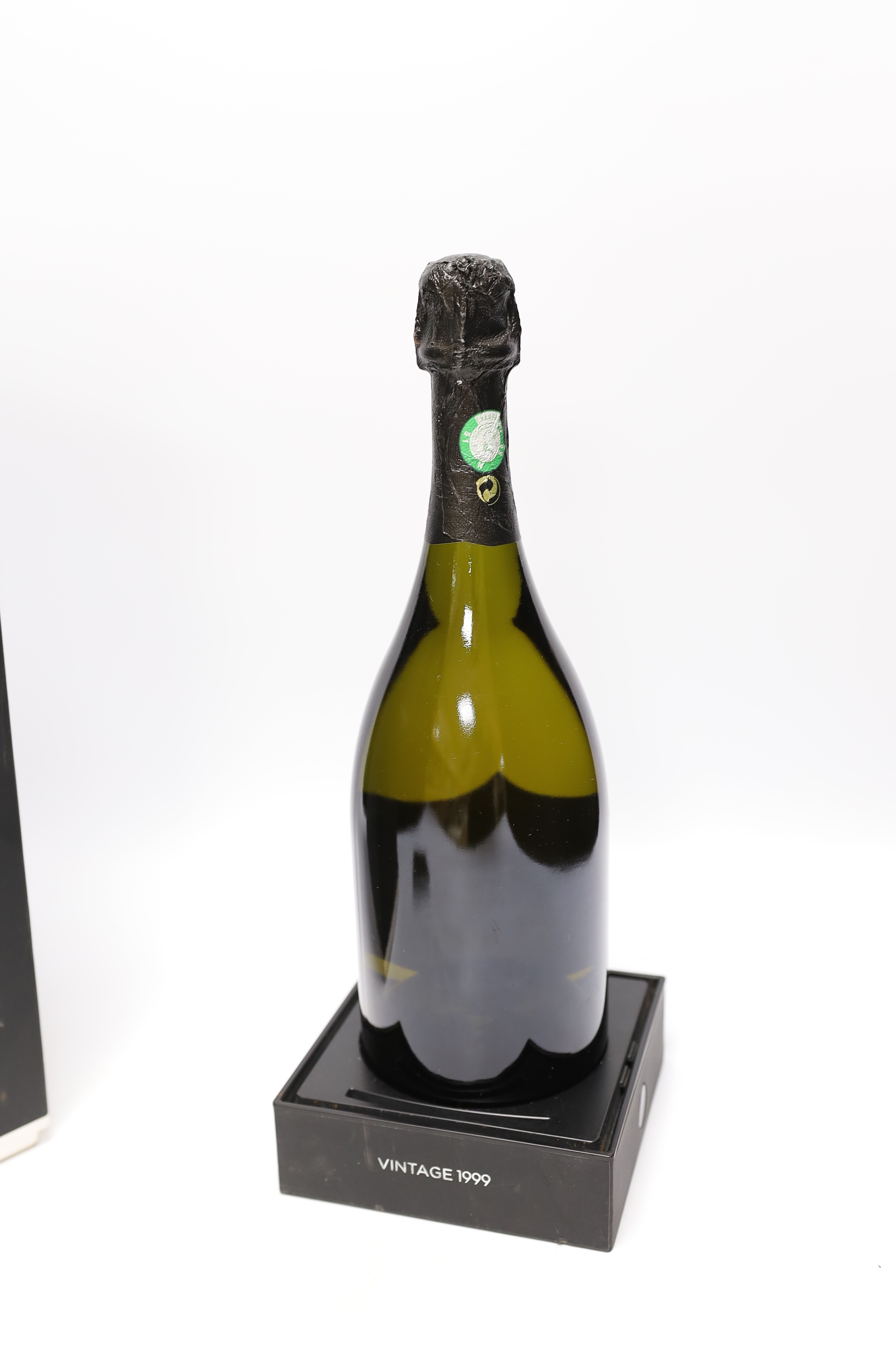 A bottle of Dom Perignon 1999 with booklet and box